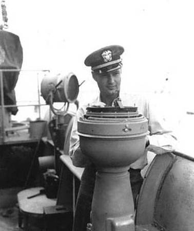 Herb Rommel conning the USS WILKES 1945